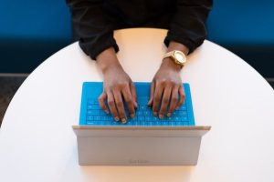 Person initiating an online divorce process on a laptop.