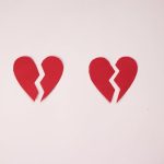 Two broken red hearts family relationships